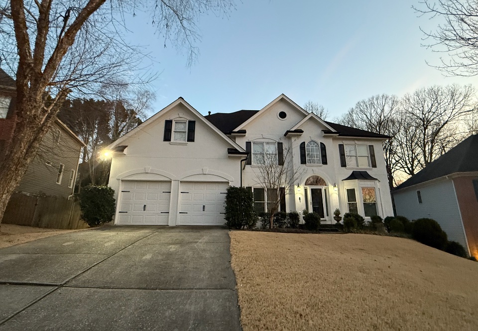 Black seamless gutter installation in Smyrna, GA by EJ3 Gutters